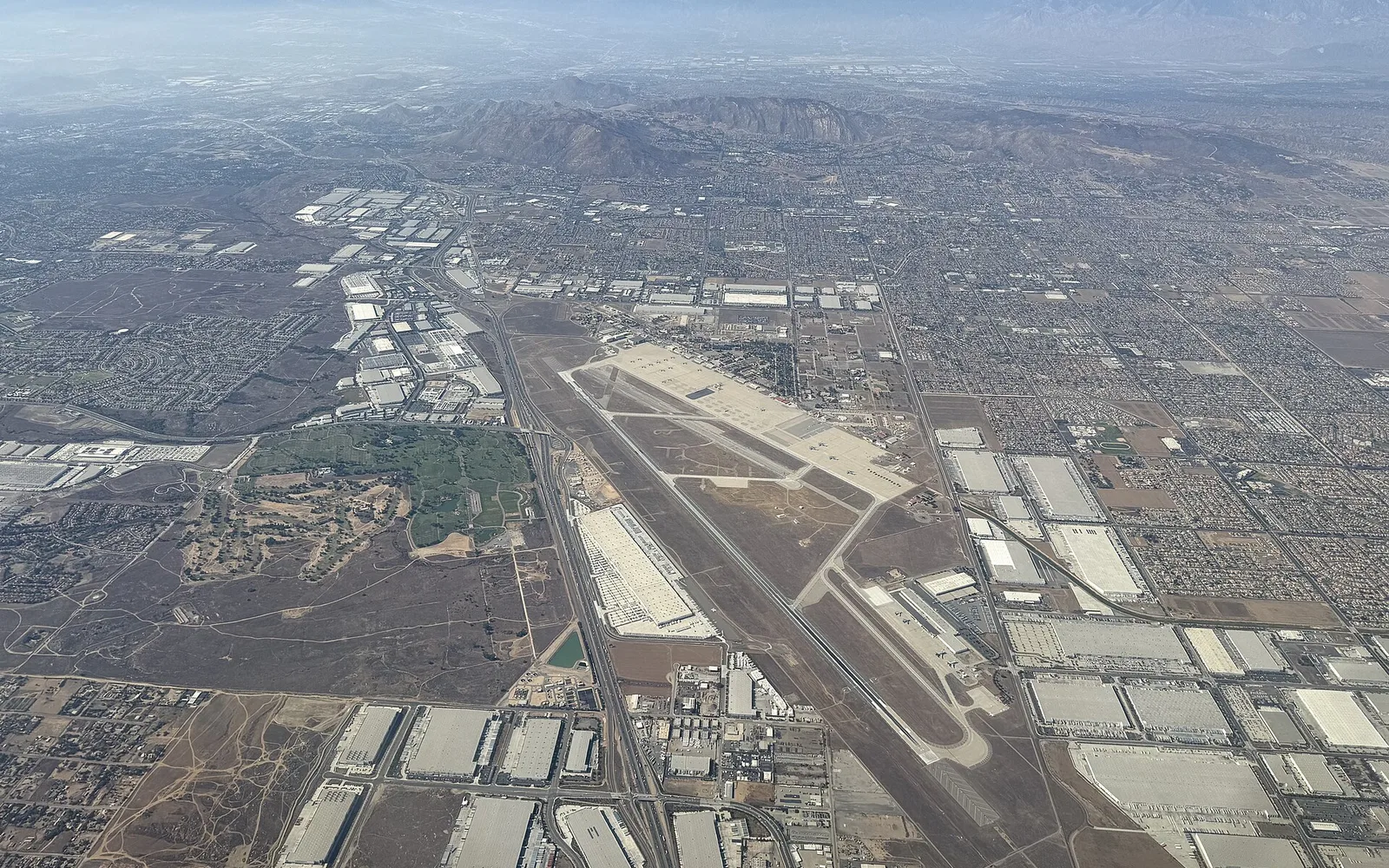 Aerial view of March Air Reserve Base and surrounding Riverside County communities, including Moreno Valley, in August 2025.