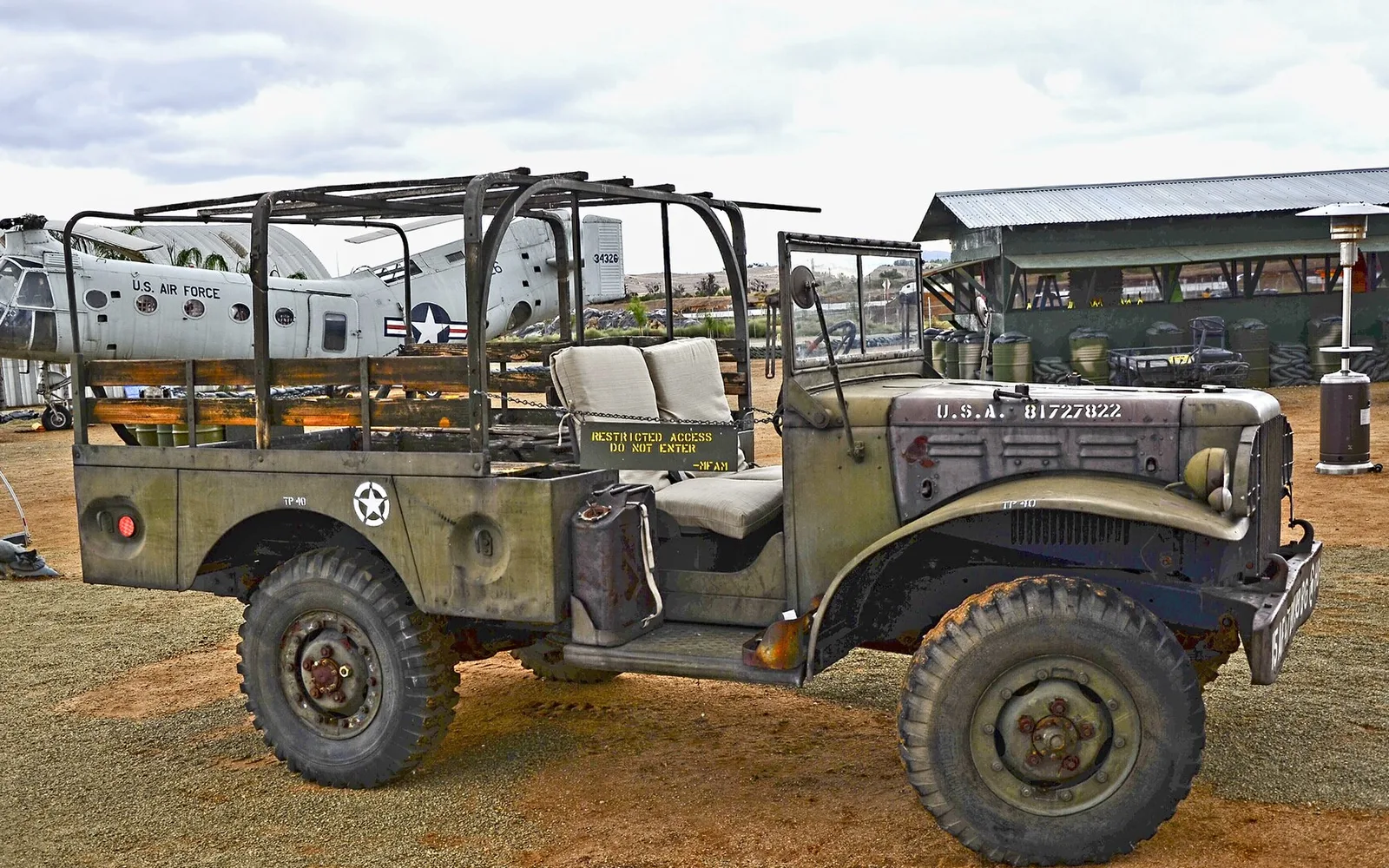 Military vehicle and aircraft exhibits at March Field Air Museum.